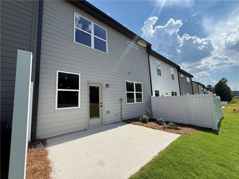 Exterior details and patio area of a home in The Towns at Auburn Station East, Auburn (Image 3).
