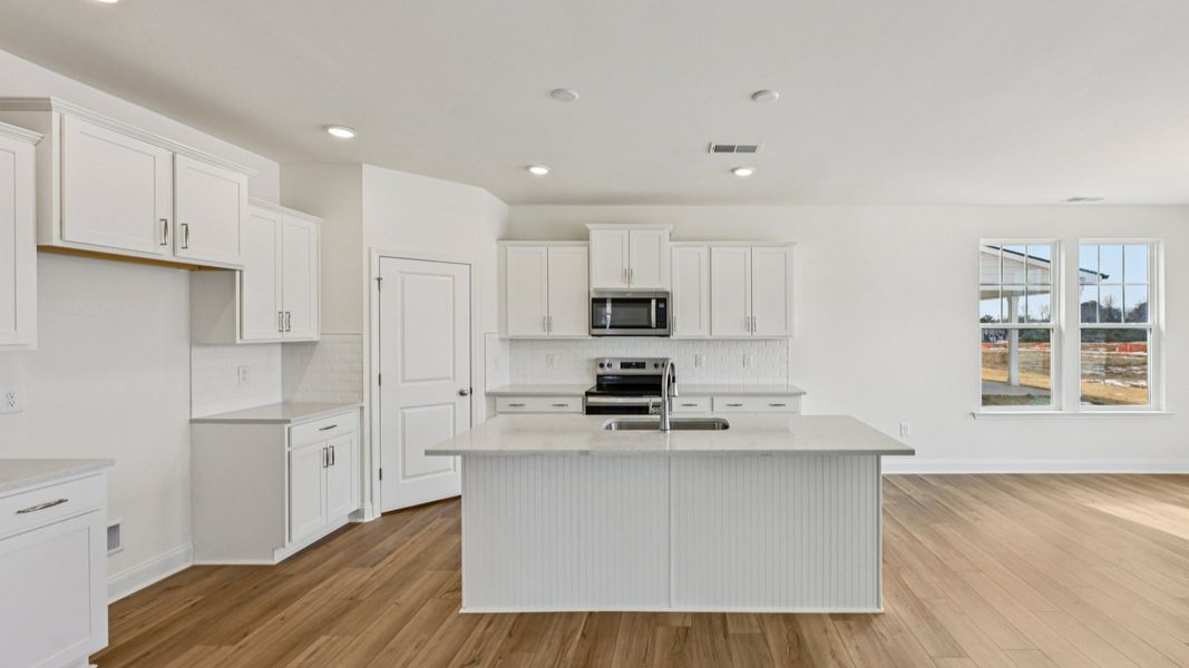 Representative furnished interior of a home built from the Merlot by DRB Homes in Station Pointe, Angier (Image 13).