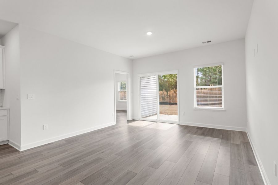 Spacious, unfurnished interior of a new home in Cypress Ridge - The Boardwalk Series, Longs (Image 12).