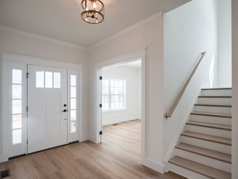 Representative unfurnished interior of a home built from the Woodford by Keystone Custom Homes in Lakestone Cove, Belmont (Image 7).