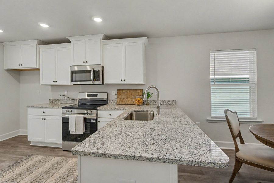 Representative furnished interior of a home built from the Plan 1250 by Adams Homes in Turtle Creek, Cantonment (Image 14).