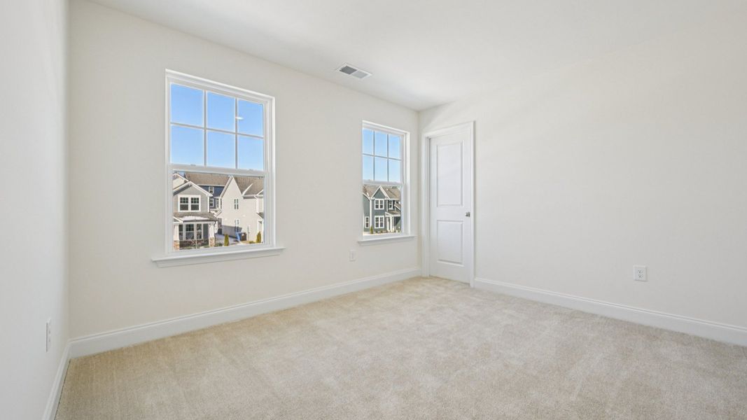 Representative furnished interior of a home built from the Wagener by DRB Homes in Station Pointe, Angier (Image 40).