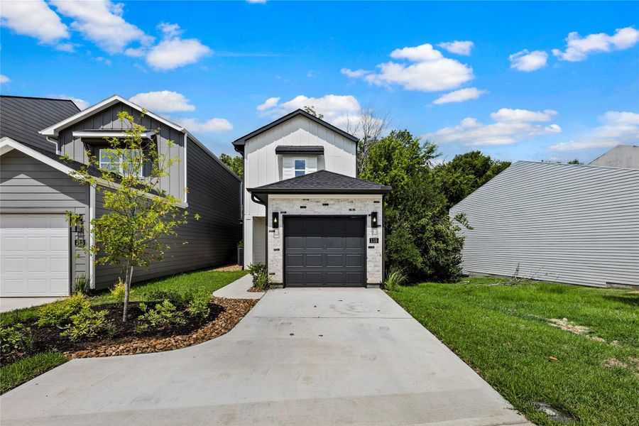 Front exterior of a new home in , Montgomery, TX, highlighting curb appeal (Image 24).