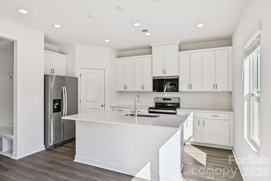 Photo is not of the actual home, but is an inspirational photo of builder’s model home and may depict options, furnishings, and/or decorator features that are not included