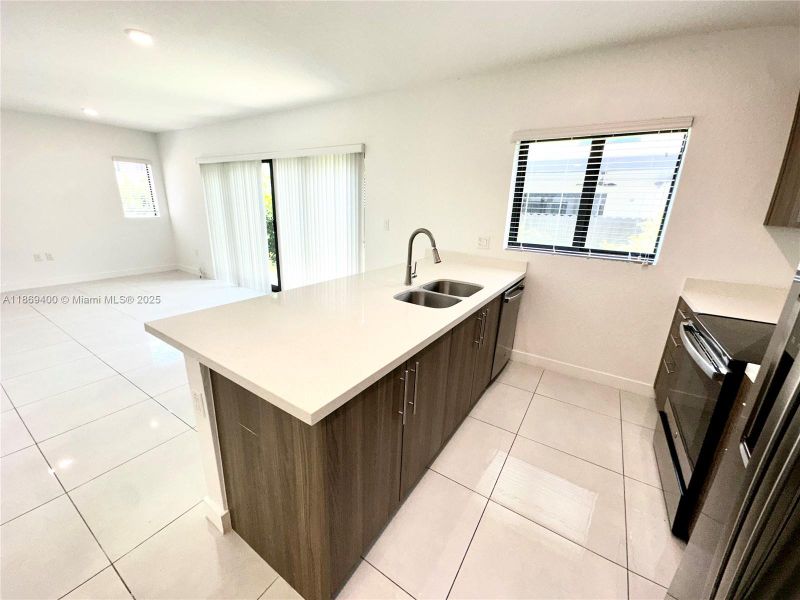 Furnished interior view inside a new home in , Florida City (Image 4).