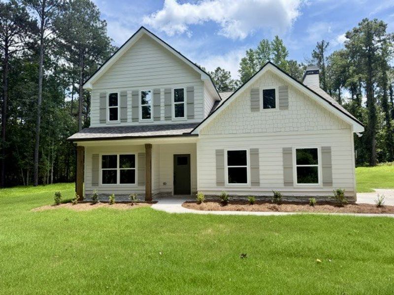 Front exterior of a new home in Rocky Mount, Greenville, GA, highlighting curb appeal (Image 1). Front exterior of a new home in Rocky Mount, Greenville, GA, highlighting curb appeal (Image 1).