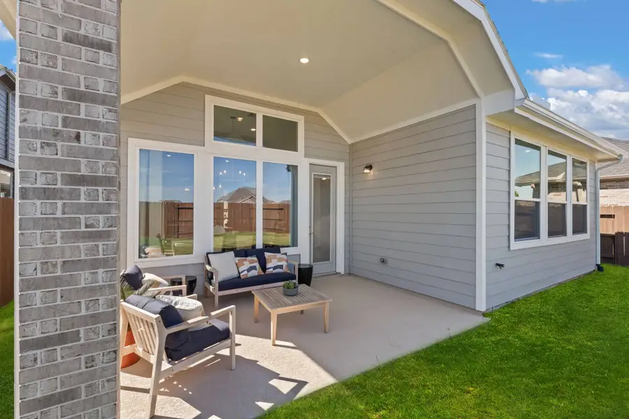 Exterior details and patio area of a home in Mulberry Farms, Santa Fe (Image 2).