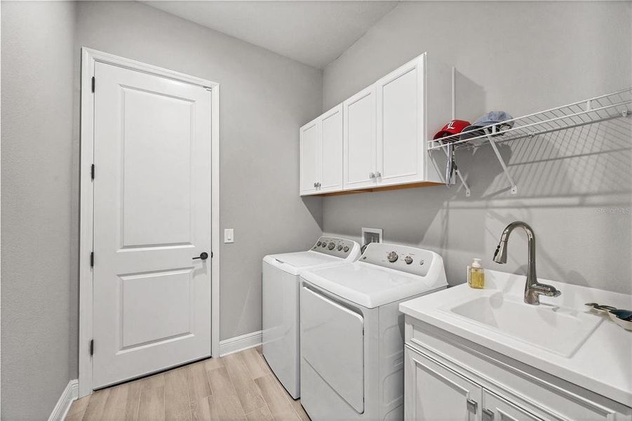 LAUNDRY AND DOOR TO GARAGE