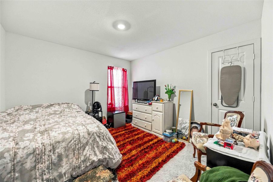 Cozy bedroom with ample space for a dresser