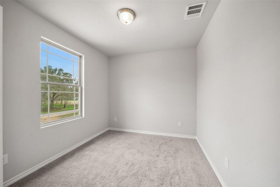 The last bedroom offers plenty of space and potential as well.