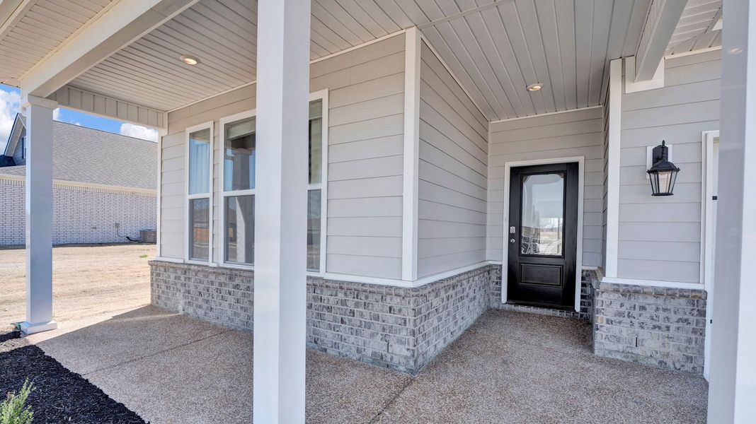 Exterior details and patio area of a home in The Orchard, Millington (Image 3).