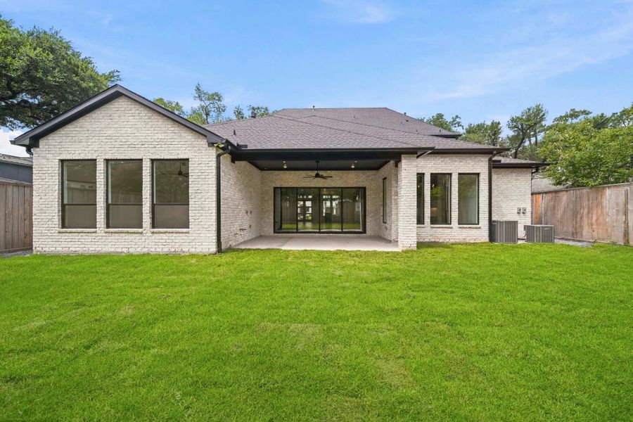 Exterior details and patio area of a home in , Houston (Image 3). Exterior details and patio area of a home in , Houston (Image 3).