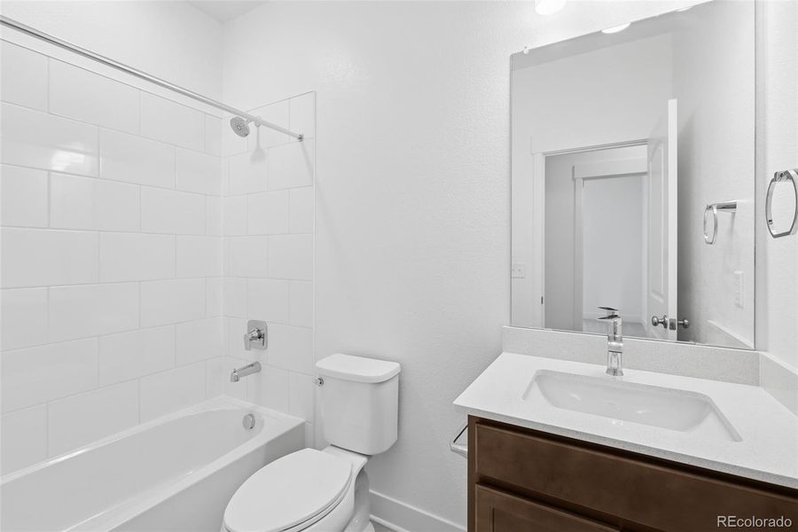 Furnished interior view inside a new home in Painted Prairie Cottage, Aurora (Image 10).