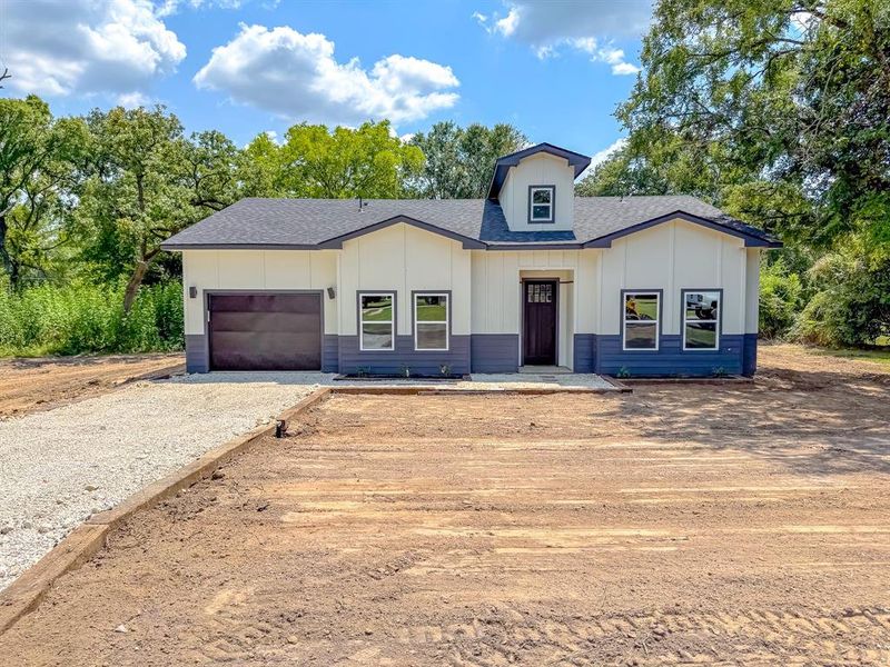 Front exterior of a new home in , Fairfield, TX, highlighting curb appeal (Image 2). Front exterior of a new home in , Fairfield, TX, highlighting curb appeal (Image 2).