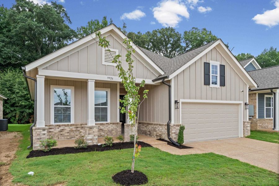 Contemporary facade featuring light beige vertical siding with contrasting white trim Contemporary facade featuring light beige vertical siding with contrasting white trim