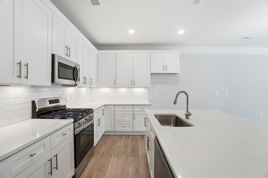 Furnished interior view inside a new home in Harrisburg Village Townhomes, Harrisburg (Image 8).