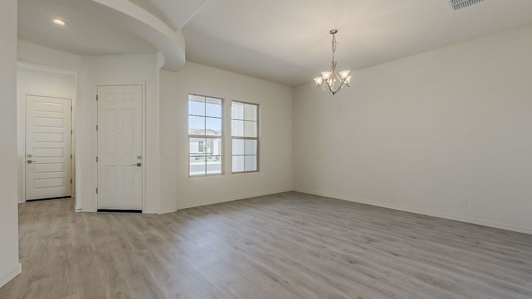 Furnished interior view inside a new home in Windrose, Waddell (Image 17).