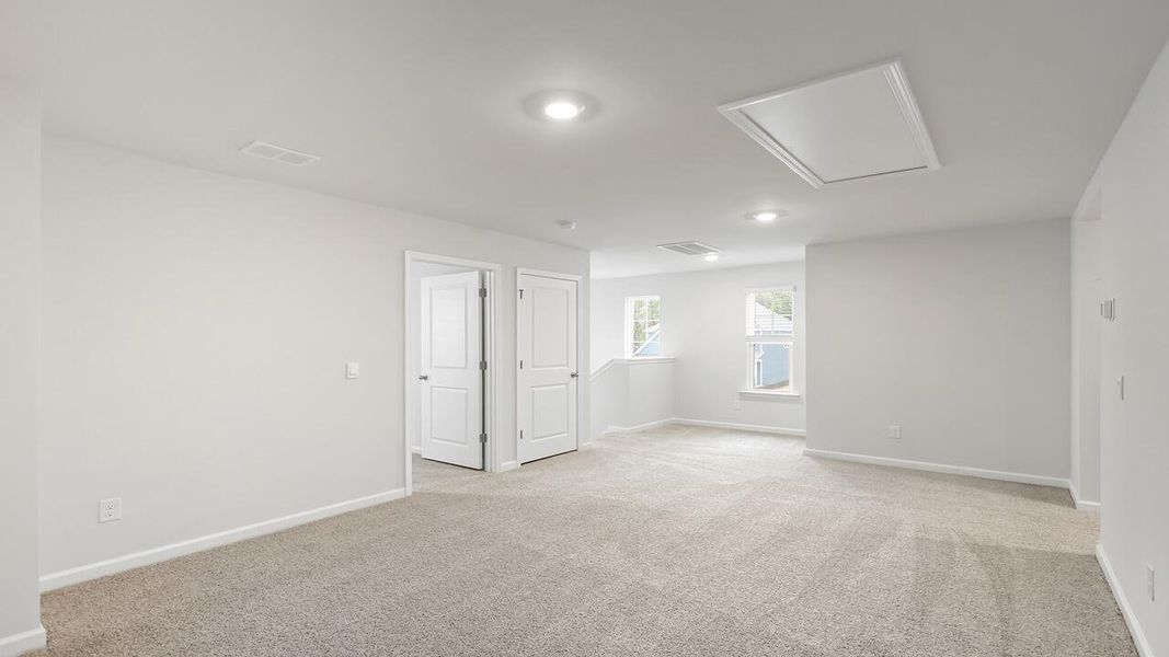 Spacious, unfurnished interior of a new home in The Cove at Mallard Crossing, Summerville (Image 20).