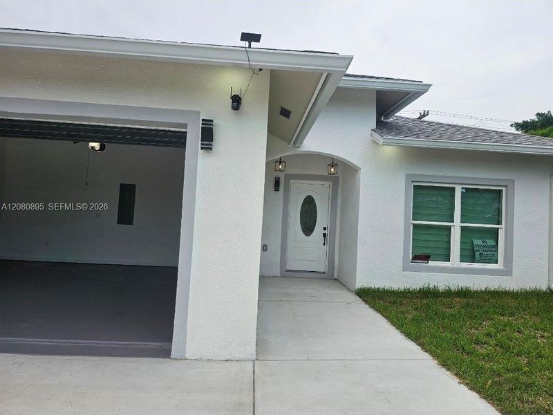 Exterior details and patio area of a home in , West Palm Beach (Image 3).
