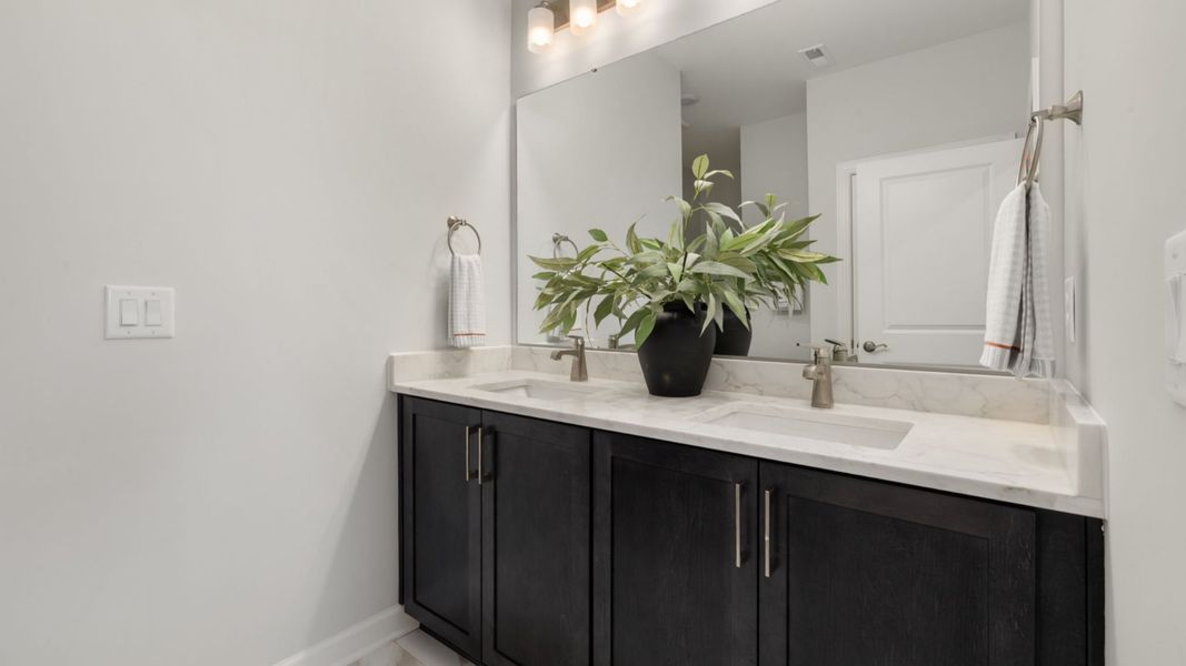 Furnished interior view inside a new home in The Courtyards at Oak Grove, Durham (Image 19).
