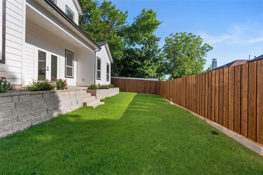 View of fenced backyard