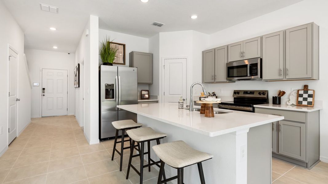 Representative furnished interior of a home built from the Jasmine by Taylor Morrison in The Towns at Firethorn, Parrish (Image 17).