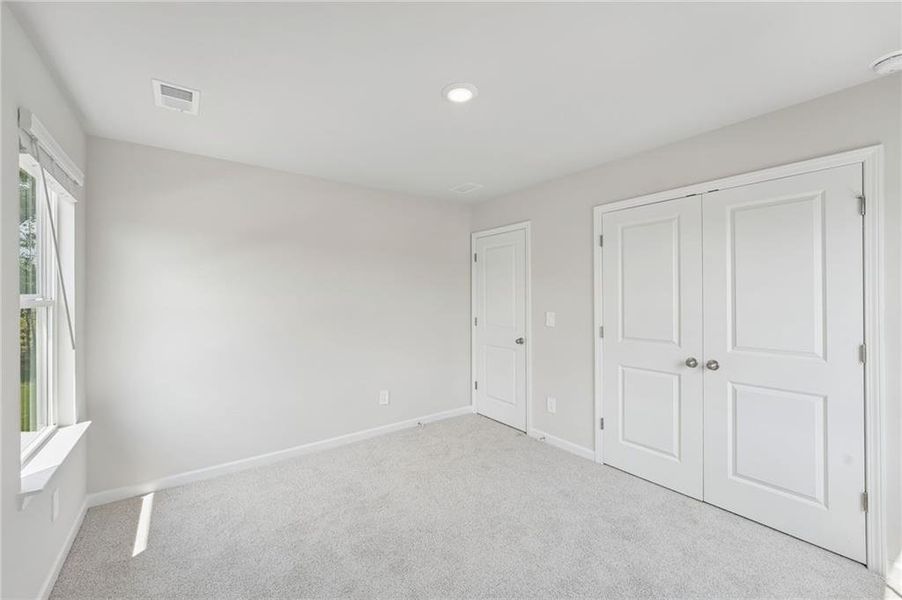 Spacious, unfurnished interior of a new home in Northwoods at Mirror Lake, Villa Rica (Image 35).