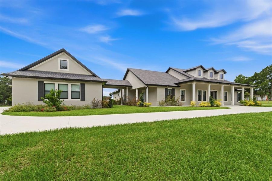 Front exterior of a new home in , Dade City, FL, highlighting curb appeal (Image 1). Front exterior of a new home in , Dade City, FL, highlighting curb appeal (Image 1).