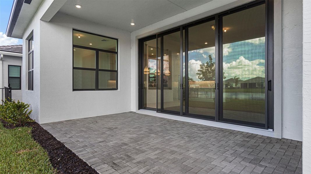 Exterior details and patio area of a home in Cresswind Palm Beach at Westlake, Westlake (Image 4). Exterior details and patio area of a home in Cresswind Palm Beach at Westlake, Westlake (Image 4).