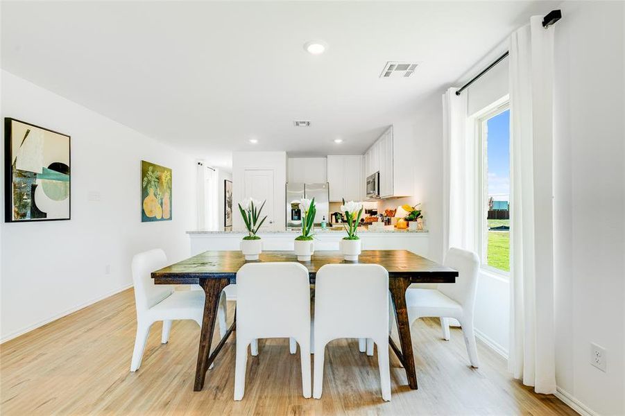 Dining room with light wood-type flooring