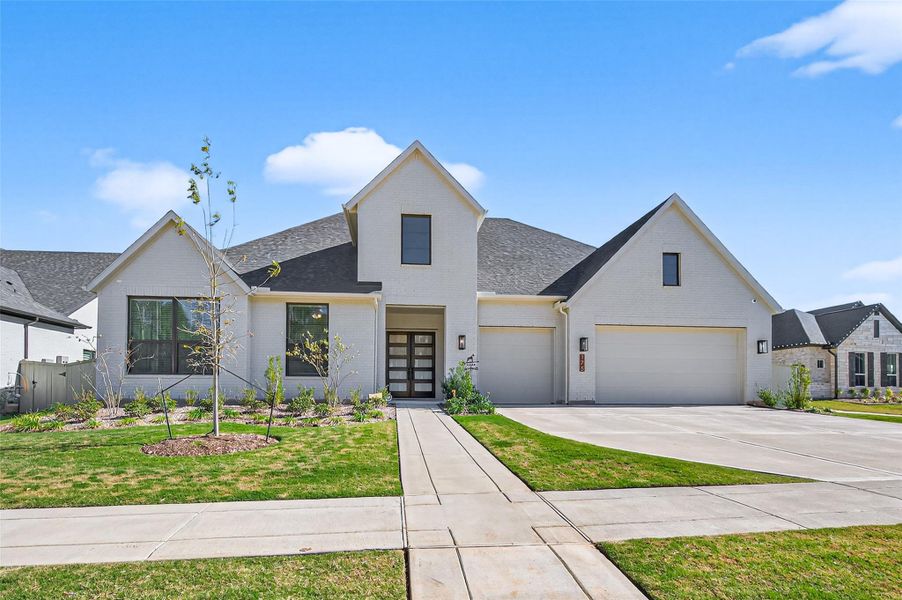Front exterior of a new home in , Magnolia, TX, highlighting curb appeal (Image 2). Front exterior of a new home in , Magnolia, TX, highlighting curb appeal (Image 2).