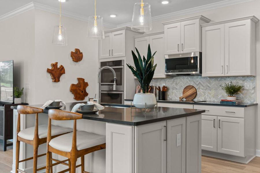 Representative furnished interior of a home built from the The Hibiscus by Chesapeake Homes in Coastal Club of the Carolinas, Calabash (Image 10).