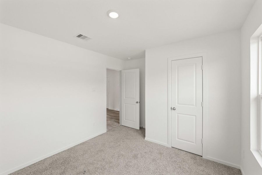 Spacious, unfurnished interior of a new home in Grand Pines, Magnolia (Image 11).