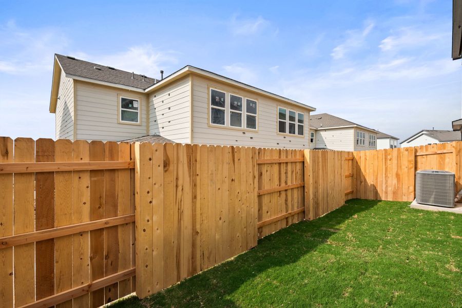 Exterior details and patio area of a home in Park Central, Georgetown (Image 26).