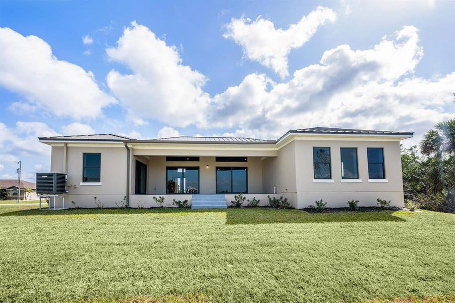 Front exterior of a new home in , Punta Gorda, FL, highlighting curb appeal (Image 1). Front exterior of a new home in , Punta Gorda, FL, highlighting curb appeal (Image 1).