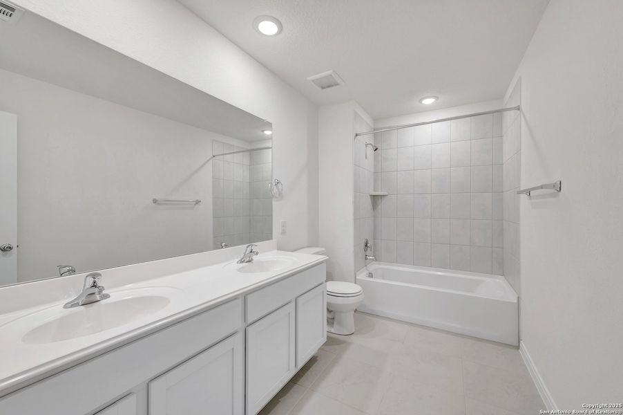 Furnished interior view inside a new home in Paloma Park, Converse (Image 11).