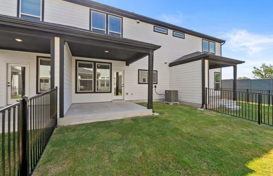 Front exterior of a new home in Whitestone Preserve, Cedar Park, TX, highlighting curb appeal (Image 1).