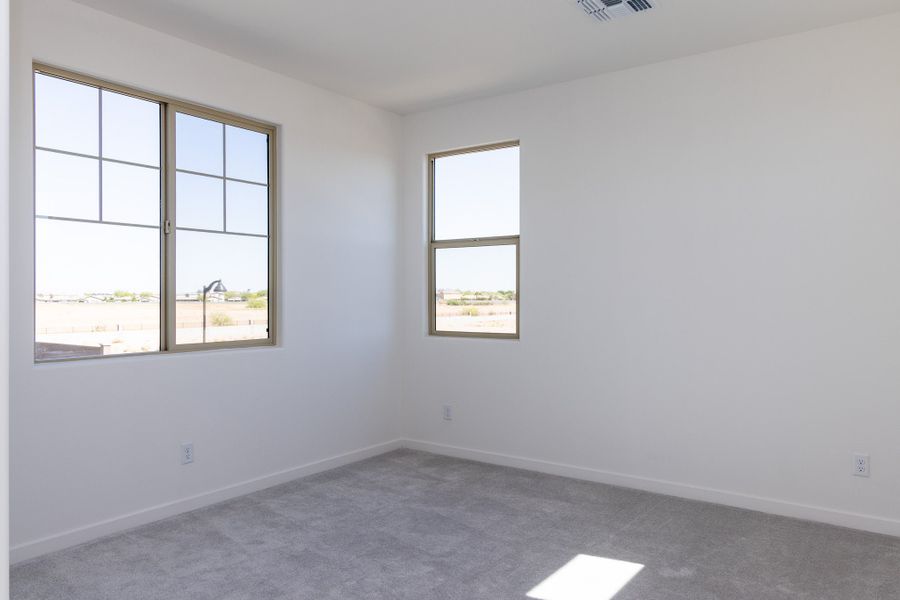 Spacious, unfurnished interior of a new home in Rancho Santa Rosa, Maricopa (Image 18).
