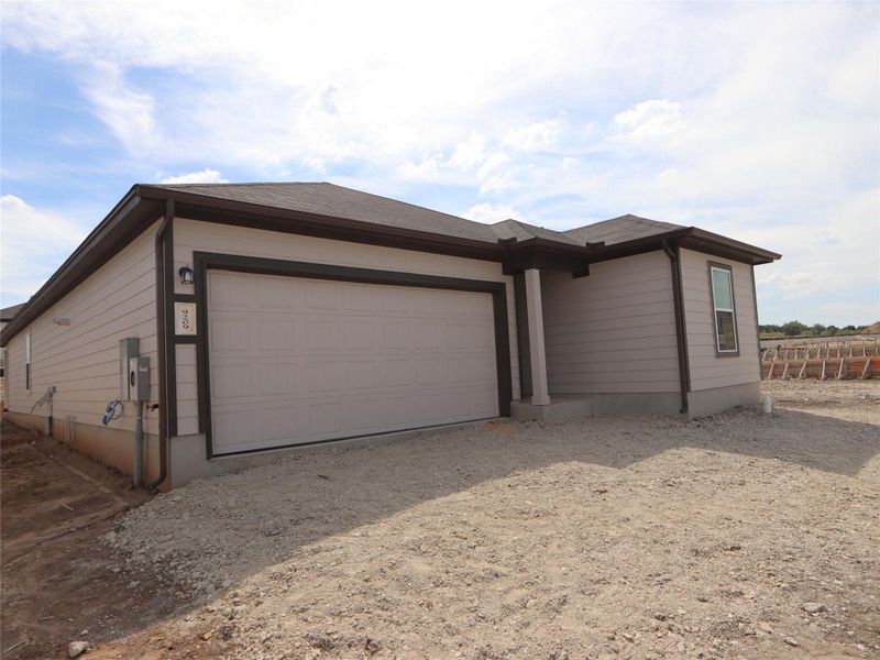 Exterior details and patio area of a home in Marble Creek Crossing, Austin (Image 14).