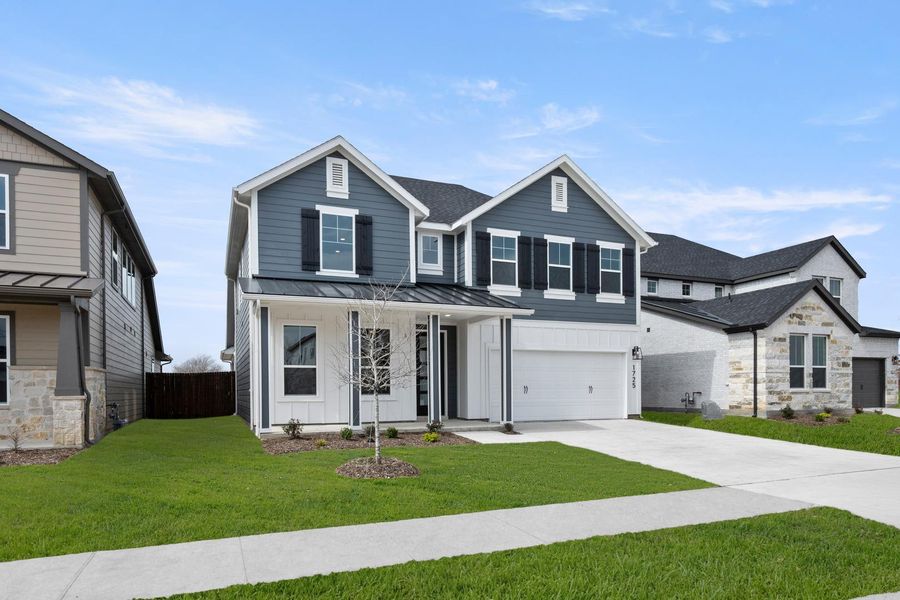 Front exterior of a new home in The Meadows, Denton, TX, highlighting curb appeal (Image 2). Front exterior of a new home in The Meadows, Denton, TX, highlighting curb appeal (Image 2).