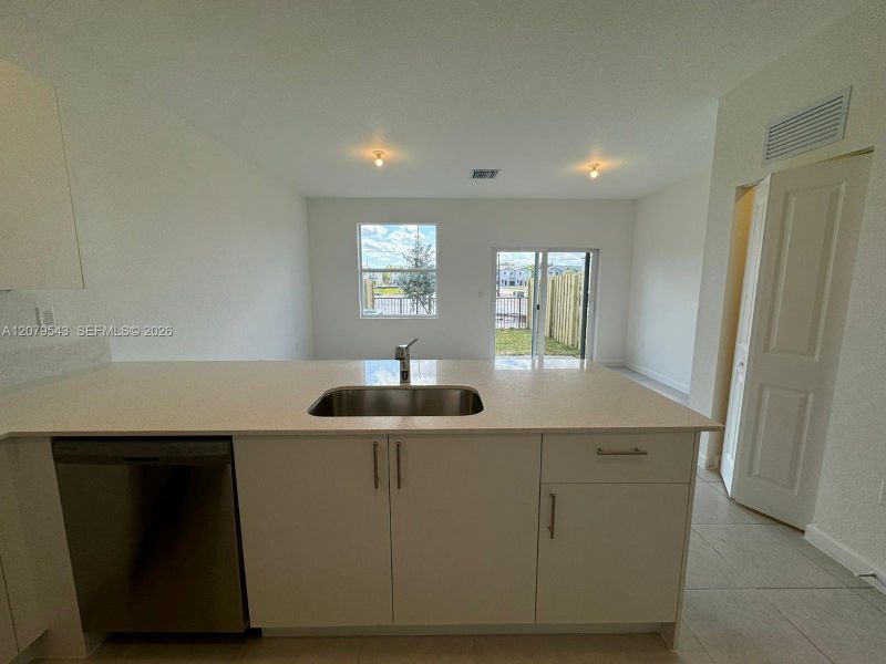 Furnished interior view inside a new home in , Homestead (Image 1). Furnished interior view inside a new home in , Homestead (Image 1).