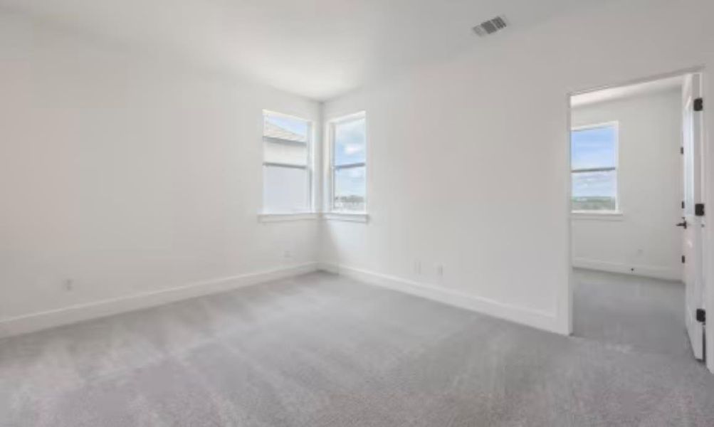 Spacious, unfurnished interior of a new home in Ryegrass Collection – Freedom at Anthem, Kyle (Image 11).