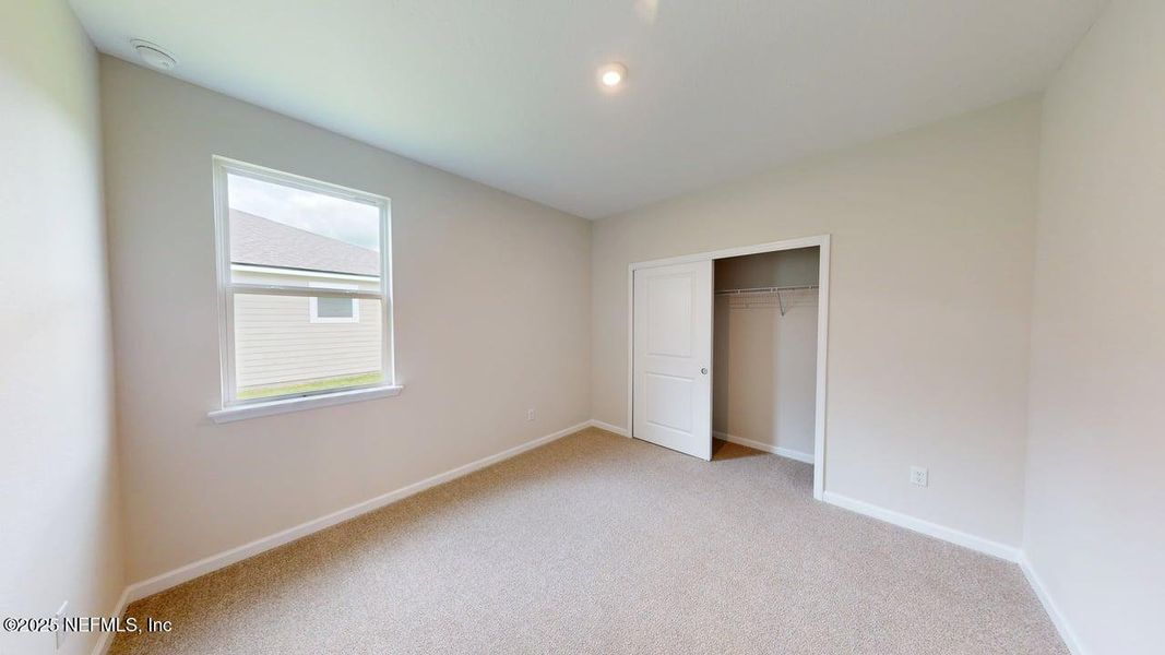 Spacious, unfurnished interior of a new home in Lakes at Bella Lago, Green Cove Springs (Image 12).