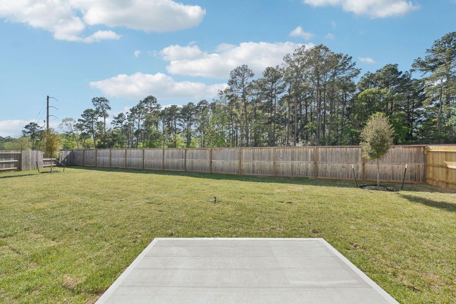 This expansive patio slab offers a seamless transition for indoor-outdoor living for year-round relaxation and entertainment.