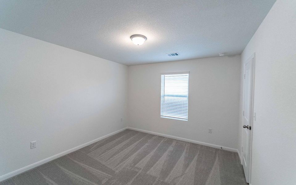 Spacious, unfurnished interior of a new home in Brooklands, Hutto (Image 6).