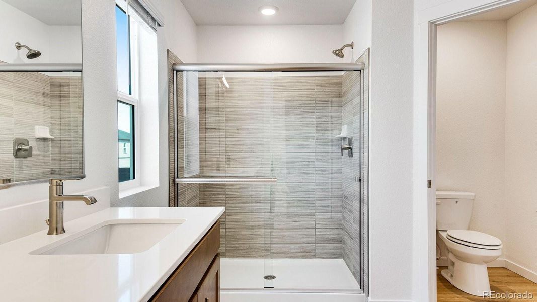 Furnished interior view inside a new home in Trails at Crowfoot, Parker (Image 11).