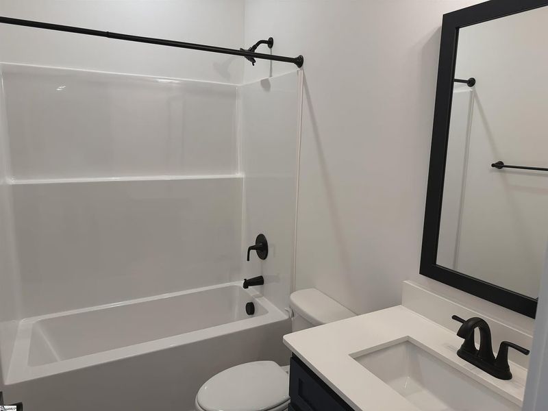 Furnished interior view inside a new home in Hidden Lake Estates, Greenville (Image 9).