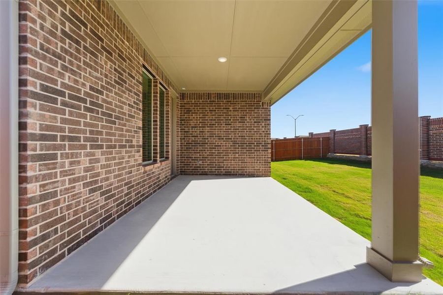 Exterior details and patio area of a home in Northstar, Haslet (Image 31).