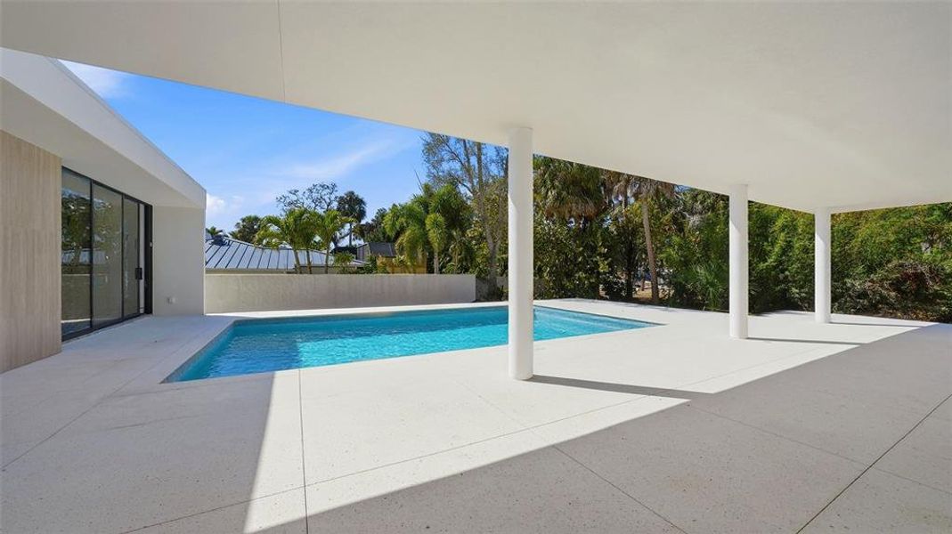 Exterior details and patio area of a home in , Sarasota (Image 3).