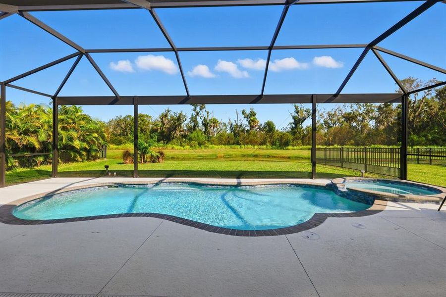 Exterior details and patio area of a home in The Reserve at Twin Rivers, Parrish (Image 2). Exterior details and patio area of a home in The Reserve at Twin Rivers, Parrish (Image 2).